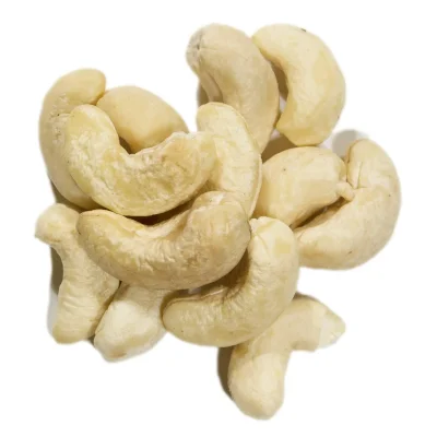 Curved, creamy-white cashew nuts displayed in a bowl, highlighting their buttery texture and mild sweetness