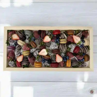 Top view of Chocolate Strawberry & Macaron Gift Tray with hand-dipped Belgian chocolate strawberries and assorted macarons.