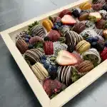 Side angle of Chocolate Strawberry & Macaron Gift Tray, highlighting the premium chocolate coating and macaron flavors.