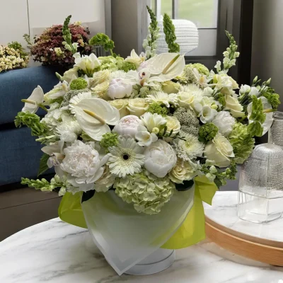 NYC same-day flower delivery – large white floral arrangement in lobby
