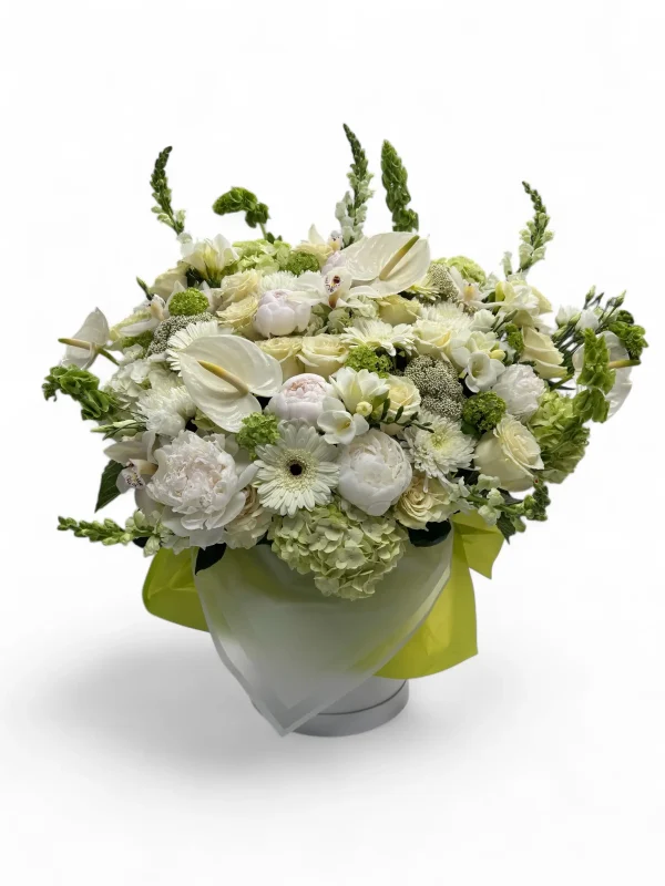 Elegant white and green bouquet in a vase, hand-delivered in New York City