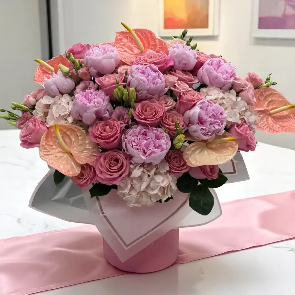 pink flower arrangement in box ready for NYC delivery