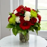 Holiday vase bouquet made for Christmas flower delivery