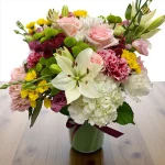 Soft pastel mixed flower arrangement styled for NYC delivery