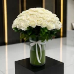 100 long stem roses in a vase NYC romantic arrangement