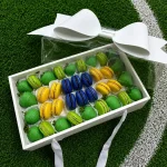 Brazil soccer fan gift box with premium chocolate covered strawberries and red and white macarons